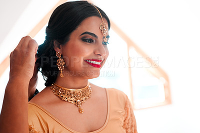 Buy stock photo Shot of a beautiful young woman getting ready for her wedding