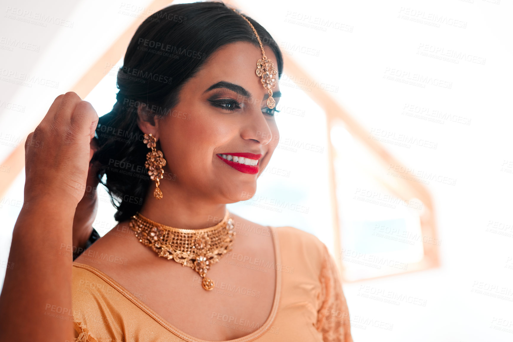 Buy stock photo Indian woman, home and makeup for wedding with jewellery, style inspiration and beauty for red lips. Bride girl, smile and cosmetics for hindu culture with traditional clothes and celebration of love