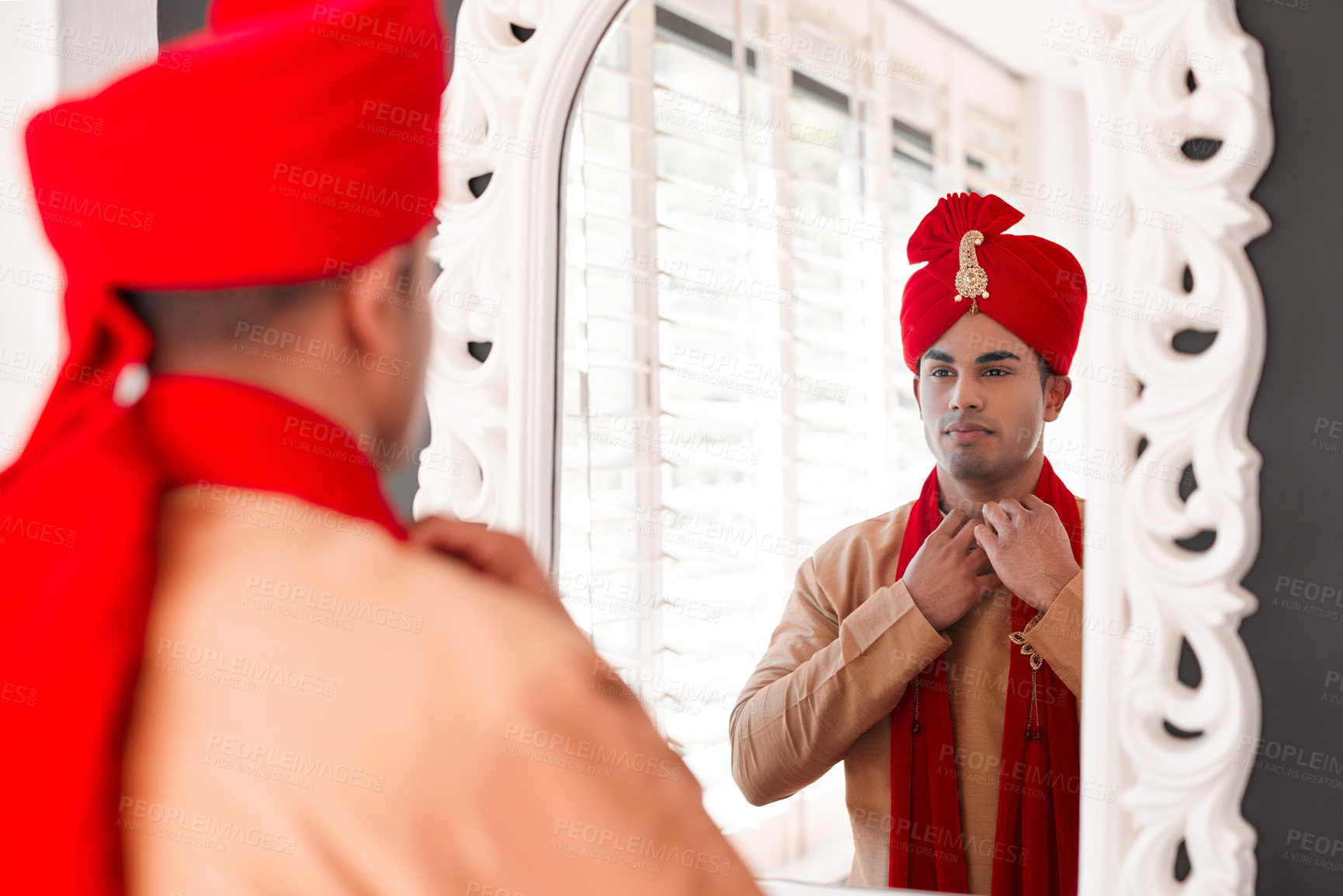 Buy stock photo Indian, groom and mirror for wedding, culture and turban for attire of man, clothes and traditional. Fitting, stylish and fashion for marriage of person in Mumbai, proud and reflection in morning
