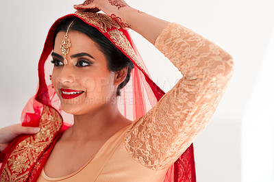 Buy stock photo Indian woman, smile and wedding fashion in studio with red saree, gold jewelry or makeup for beauty. Marriage ceremony, accessories or bride with culture for celebration, commit or hindu custom