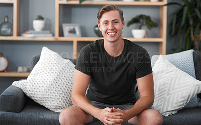 Buy stock photo Smile, portrait and face of man on sofa or home on weekend, free time and lounge. Apartment, calm and happy male on couch in living room for resting, comfortable and relaxation with confidence