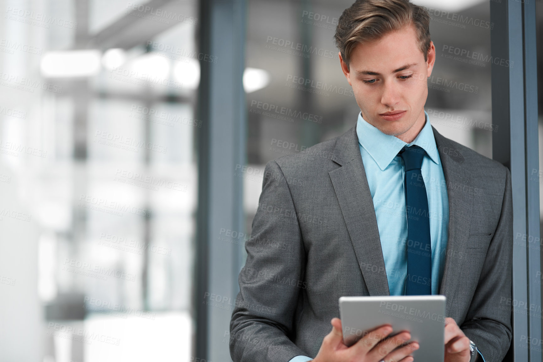 Buy stock photo Businessman, office and corporate with digital tablet for updates, sales or research in workplace. Male professional, online and browsing in business for networking, contact and email or social media