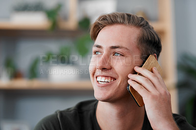 Buy stock photo Happy man, phone call and conversation for communication, social media or networking in living room. Face, young male person and smile talking on mobile smartphone for online chatting or discussion