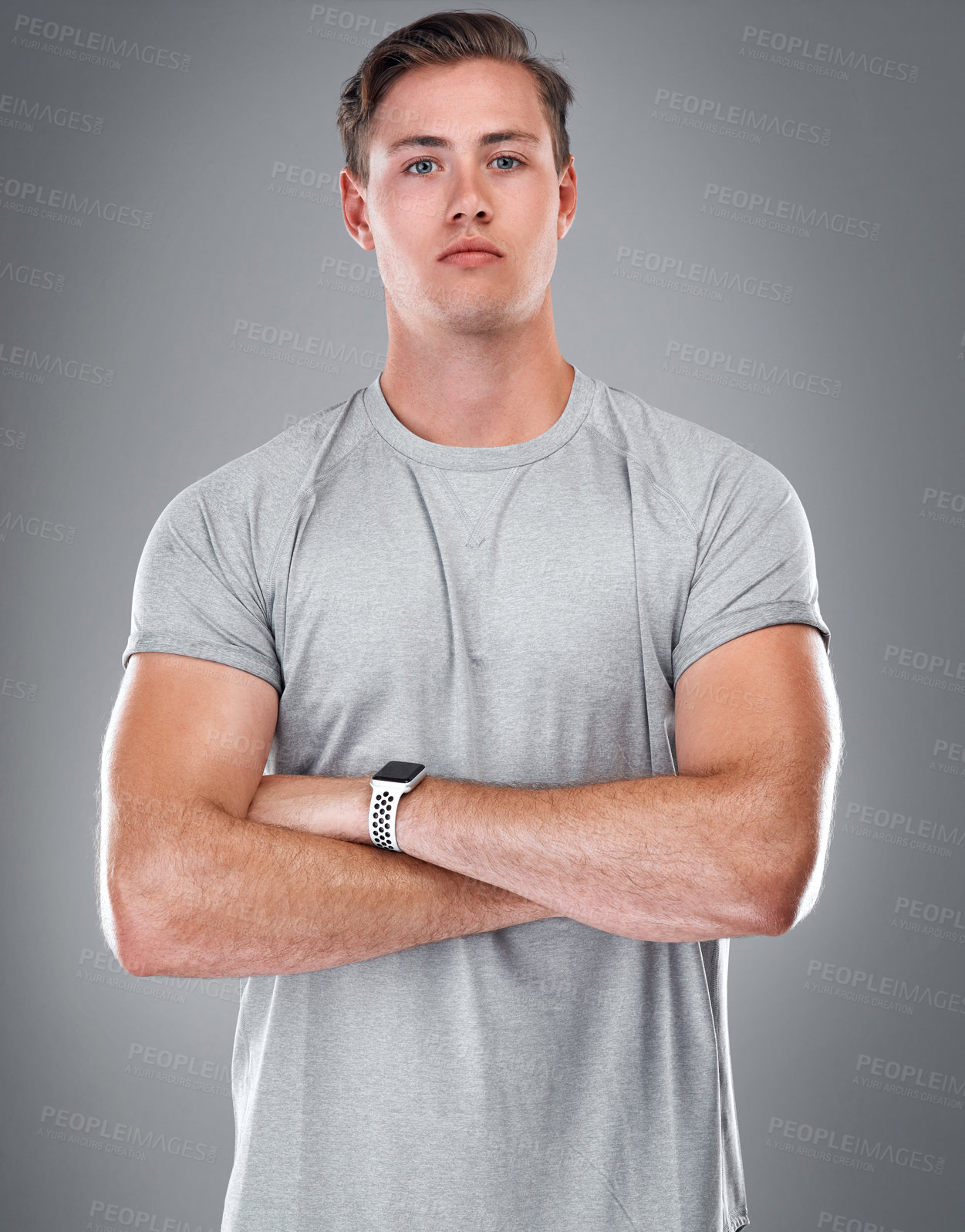 Buy stock photo Personal trainer, arms crossed and portrait of man in studio with confidence or pride, casual and trendy style. Fitness coach, model and fashion in grey background, stylish and modern outfit for men