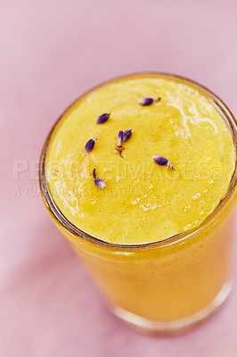 Buy stock photo Shot of a freshly made healthy smoothie on a table