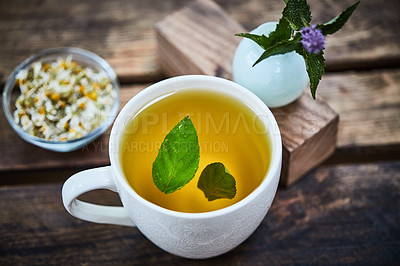 Buy stock photo Shot of a glass of freshly made herbal tea