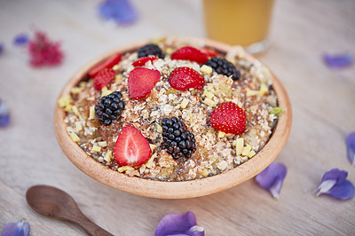 Buy stock photo Shot of a delicious breakfast meal served with fruit, nuts and seeds