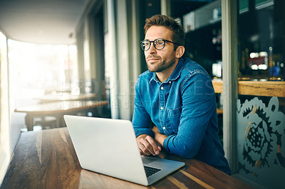 Buy stock photo Business man, laptop and thinking at coffee shop with inspiration, happy and remote work in morning. Person, writer or editor with computer, reflection and smile with ideas for project at cafeteria