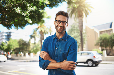 Buy stock photo Closeup shot of a handsome middle-aged man spending the day out in the city