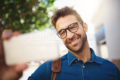 Buy stock photo Selfie, happy and man in city for travel, vacation or holiday with memory for social media or blog. Smile, glasses and male person with photography picture for sightseeing in town on weekend trip.