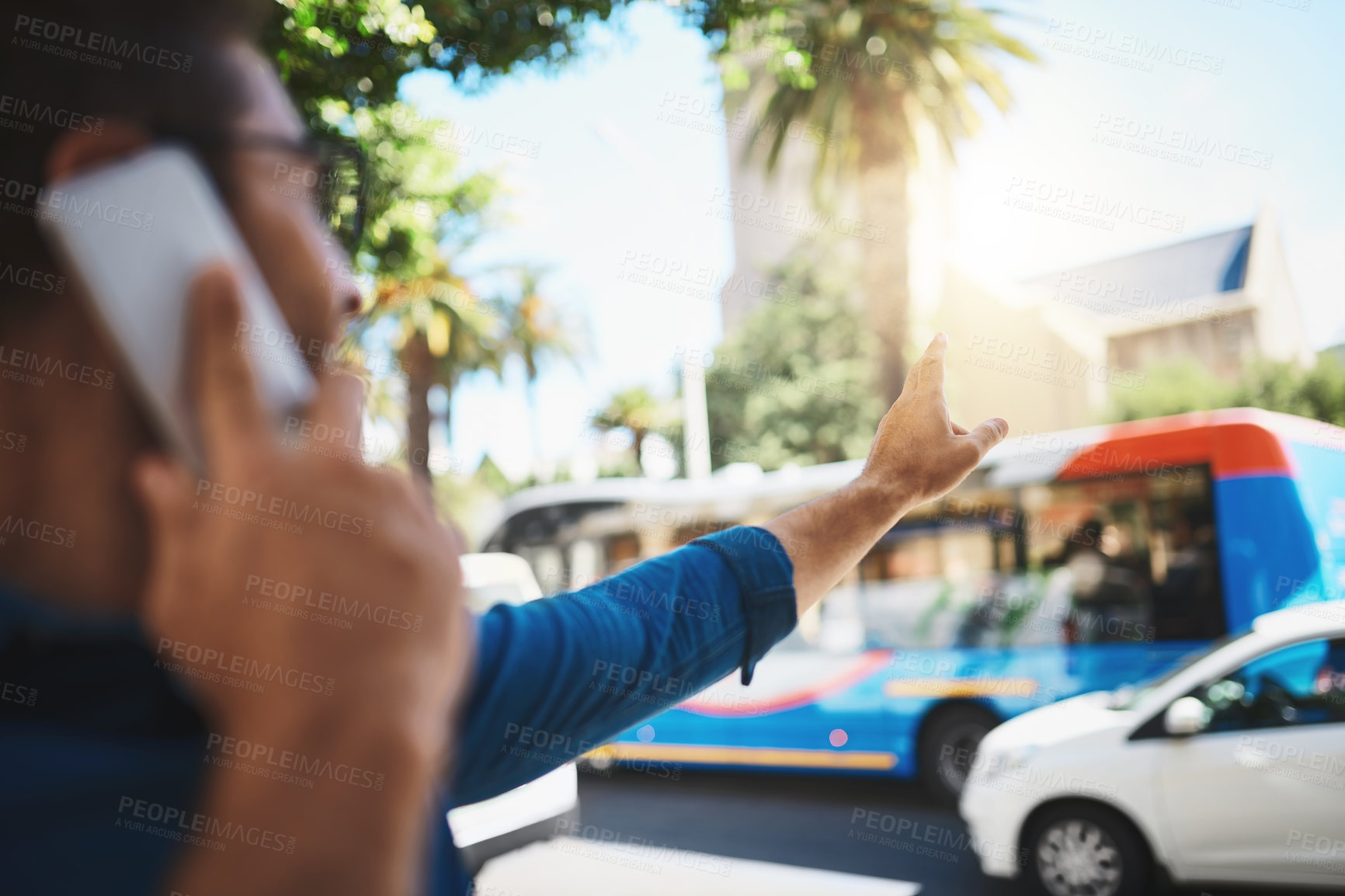 Buy stock photo Shot of a man trying to catch a cab in the city