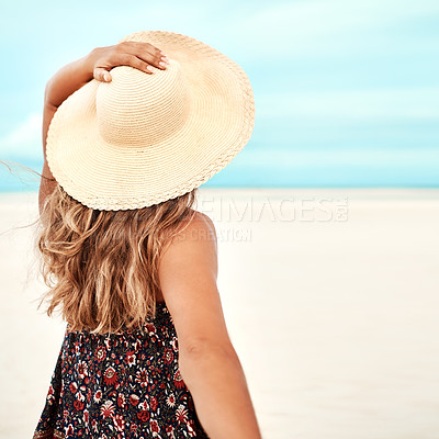 Buy stock photo Back, beach and woman with vacation, nature and relaxing with getaway trip and sunshine. Ibiza, rear view and girl with hat or seaside with summer and ocean with holiday and travelling with adventure