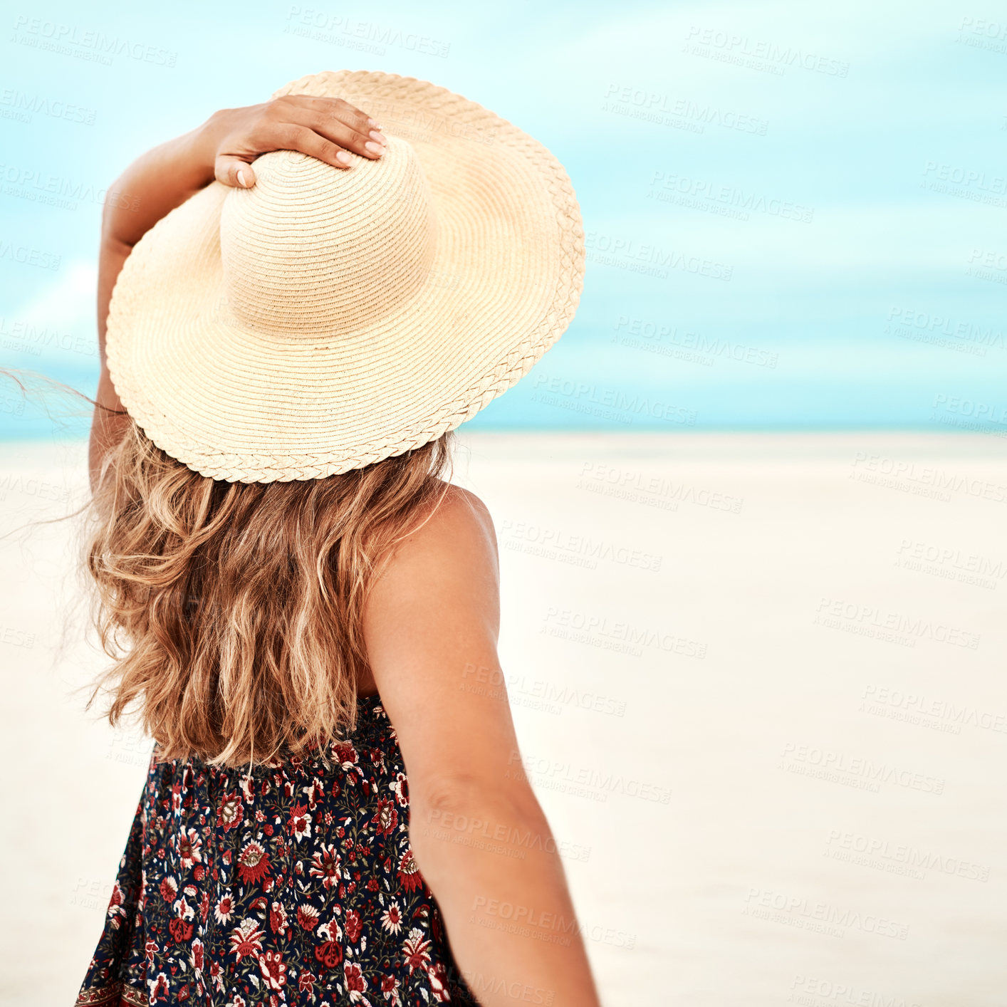 Buy stock photo Back, beach and woman with vacation, nature and relaxing with getaway trip and sunshine. Ibiza, rear view and girl with hat or seaside with summer and ocean with holiday and travelling with adventure