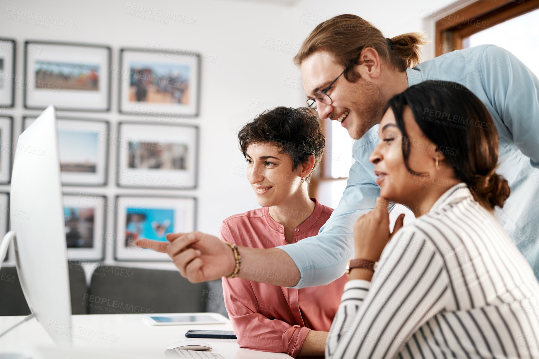 Buy stock photo Business, people and happy with pointing on computer at office for deadline or task competition. Employees, coworking and meeting with smile for teaching, learning and advice with software update