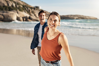 Buy stock photo Shot of a middle aged couple spending the day at the beach
