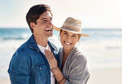 Buy stock photo Shot of a middle aged couple spending the day at the beach