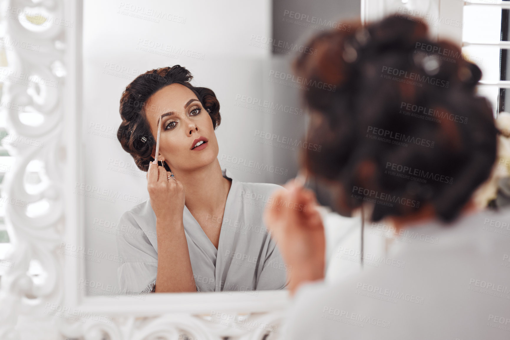 Buy stock photo Eyebrow brush, mirror reflection and woman with cosmetics application, natural skincare glow or luxury facial makeup. Wellness, skin treatment and relax person prepare for wedding in house bedroom