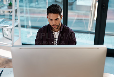 Buy stock photo Computer, business and a serious man working at a desk while online for research work on website. Male entrepreneur person with focus and internet connection for banner project or reading email