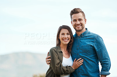 Buy stock photo Outdoor, couple and happy on portrait for love on break with bonding, date and care in Spain. People, hug and smile or satisfied with vacation to relax, chill and affection with support as lovers