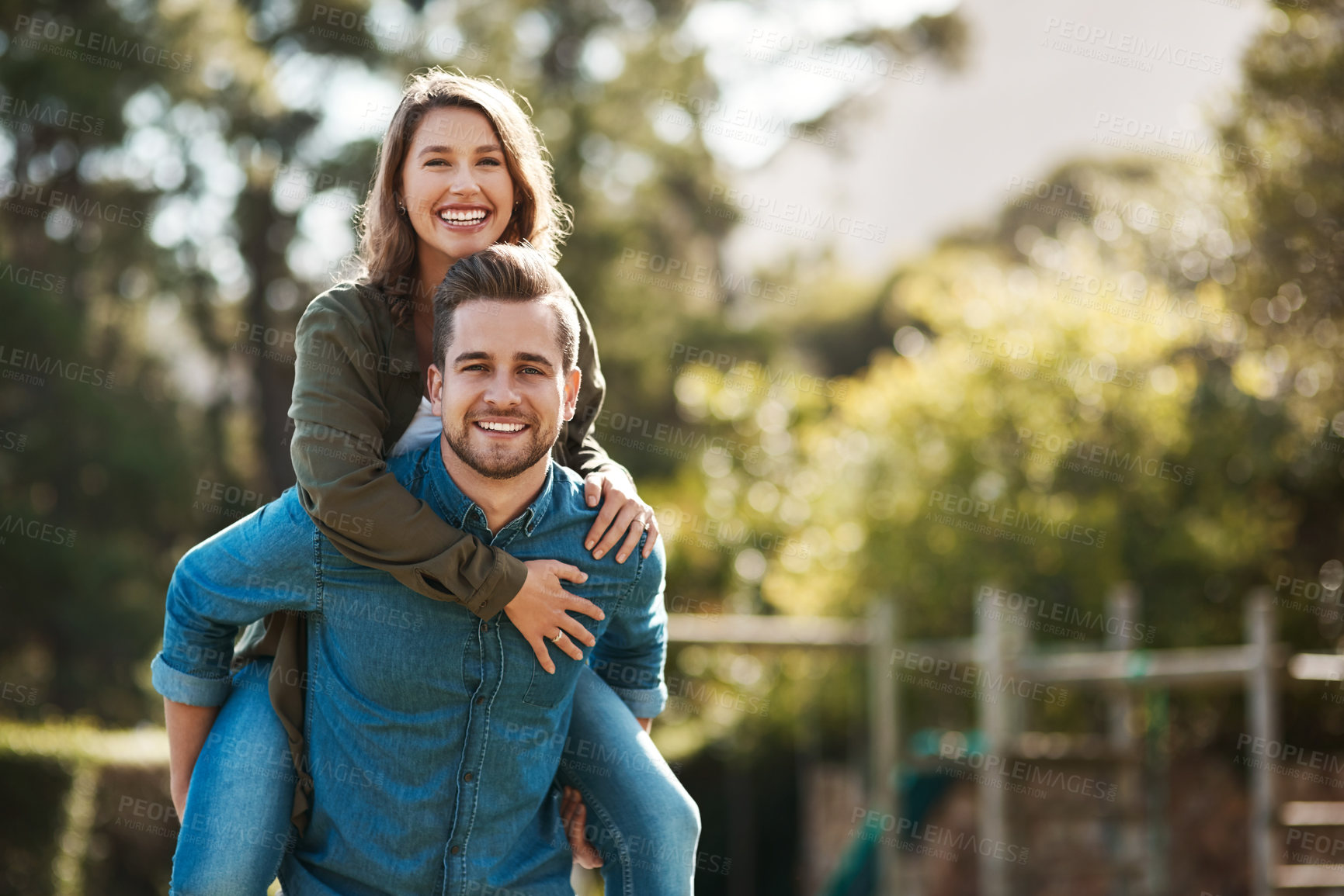 Buy stock photo Cropped shot of a happy young couple spending quality time outdoors