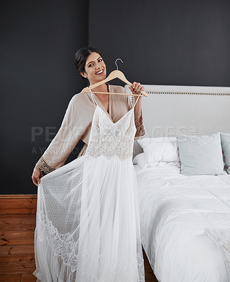 Buy stock photo Cropped portrait of an attractive young bride getting ready for her wedding ceremony in her bedroom