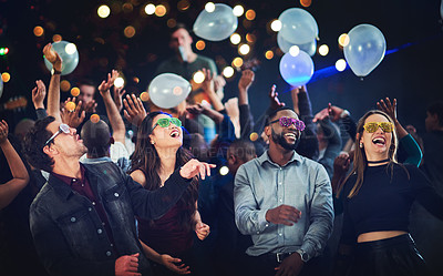 Buy stock photo Friends, celebrate ad balloons in happy hour, new year or club concert event for celebration. Diversity, festival and performance happiness of crowd of people together with music and nightclub show