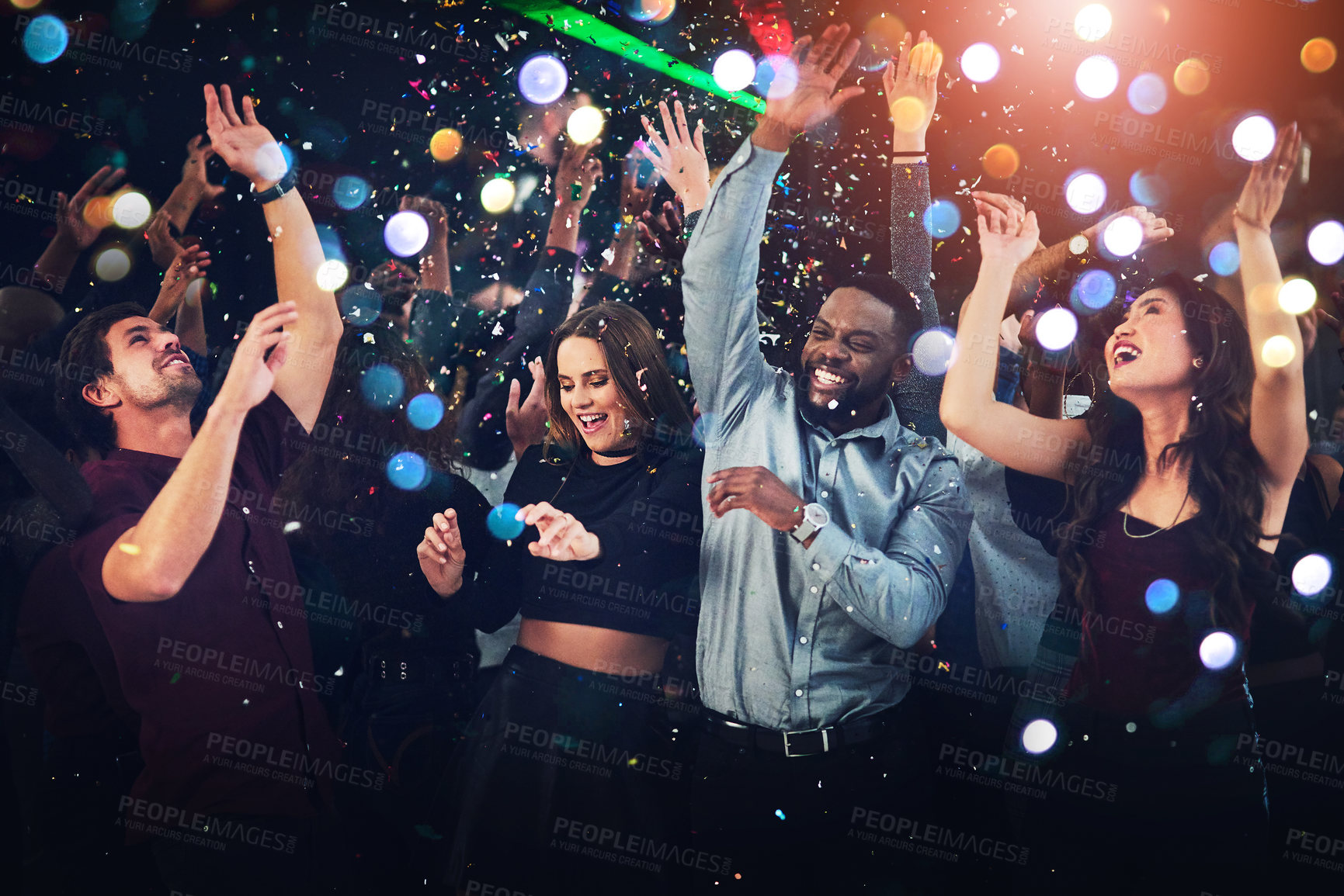 Buy stock photo Dance, music and party with friends at night for new year, festival and disco for celebration. Social, event and happy hour with people and confetti at nightclub show for rave, techno and concert