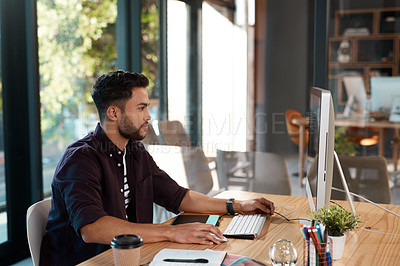 Buy stock photo Office, designer and man working on computer at desk while online for research or creative work. Male entrepreneur person at workplace with internet connection for business project or reading email