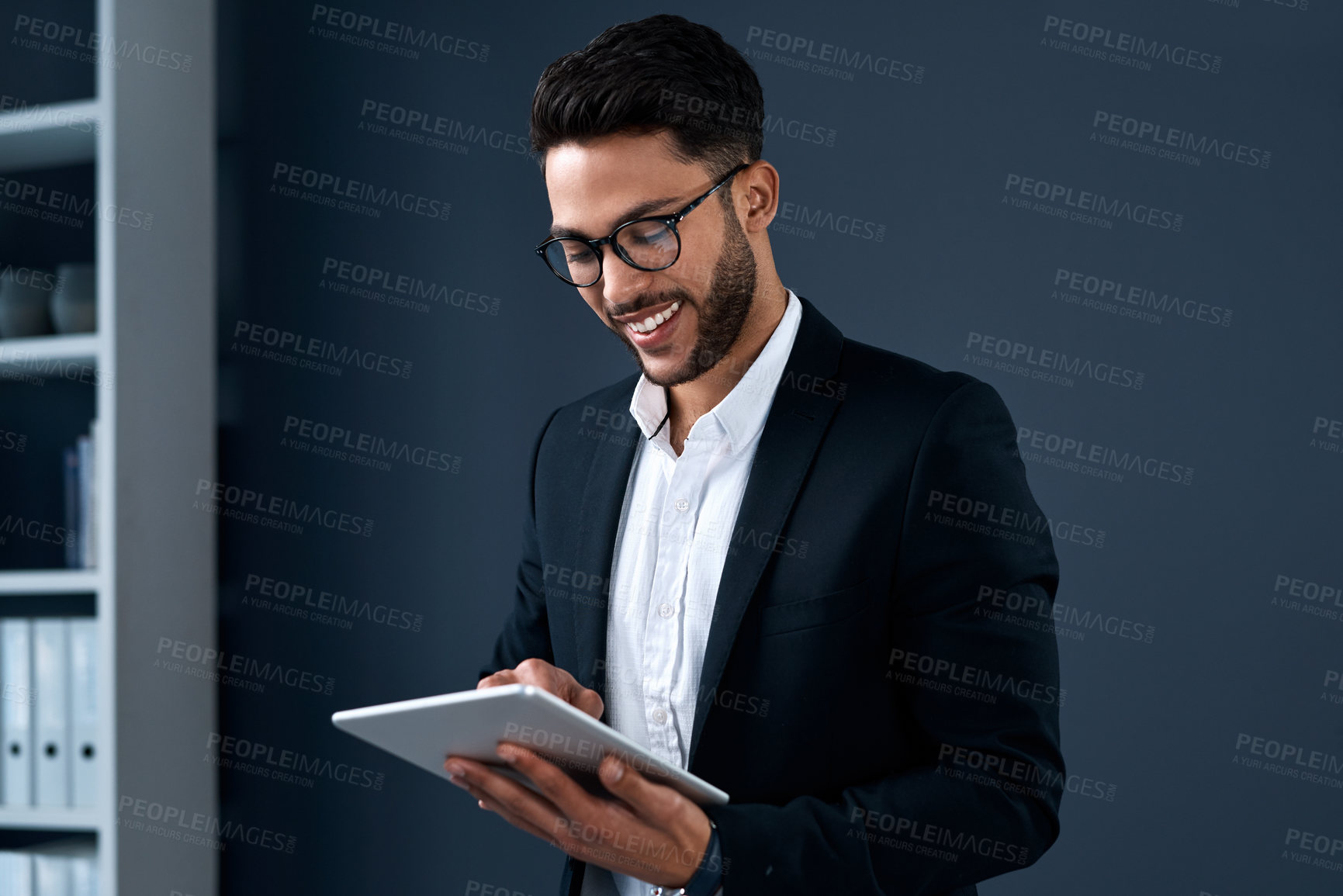 Buy stock photo Tablet, happy and businessman in office with research on stock market for company investment. Communication, smile and male financial advisor reading online email on digital technology in workplace.