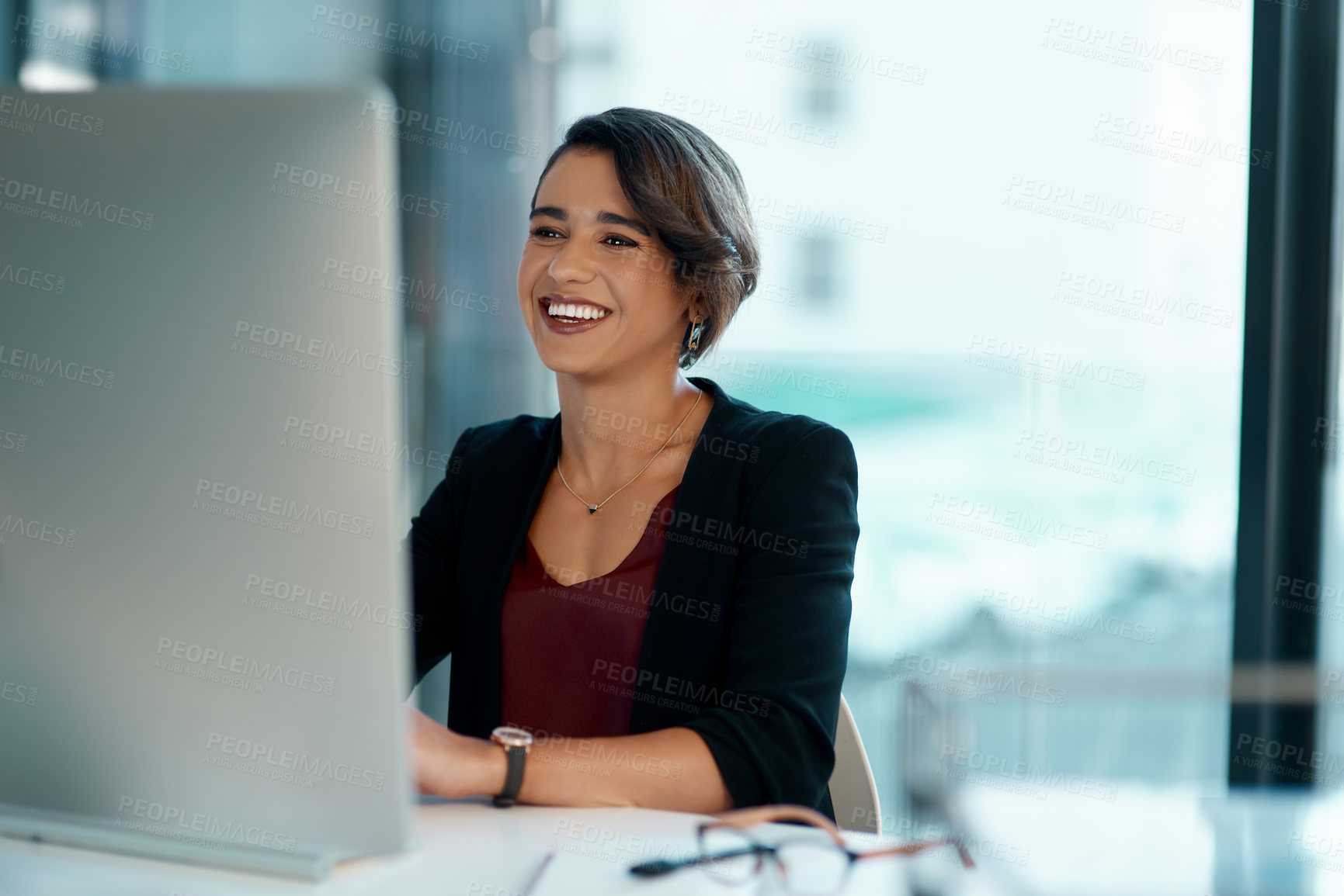 Buy stock photo Happy, corporate woman and computer with vision, planning and confidence in career as receptionist. Smile, female person and technology for email communication, scheduling and networking in office