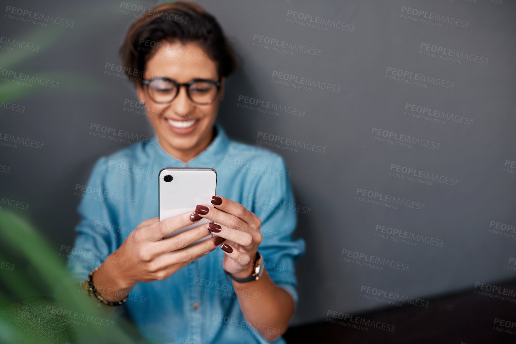 Buy stock photo Hands, smartphone and happy woman by plant for funny text, meme or update on social media. Scrolling, cellphone and female influencer with glasses for joke, comedy and humor story on online platform