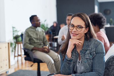 Buy stock photo Portrait of a young businesswoman having a meeting with colleagues in a modern office