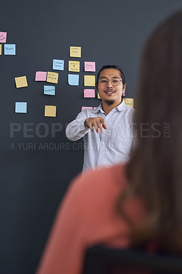Buy stock photo Meeting, brainstorming and presentation with team, man speaker and sticky note with leadership at startup. Collaboration, people in strategy planning workshop and ideas with presenter and audience