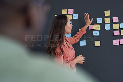 Buy stock photo Woman, coach and blackboard with sticky notes in office for training, teaching and learning for skill development. People, employee and mentor or leader at workshop with internship program for career