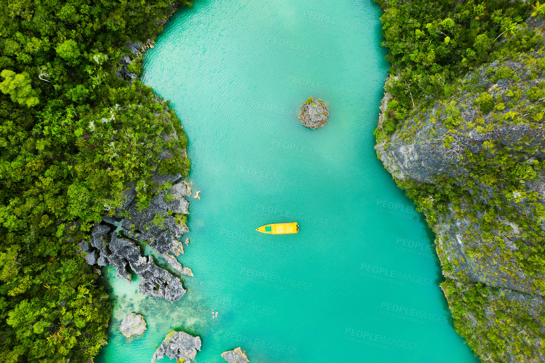 Buy stock photo Nature, drone and boat on sea with greenery on a tropical island at summer vacation travel. Environment, lake water and aerial view of outdoor river with forestry mountains and plants in environment.