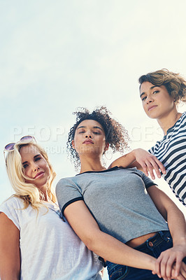 Buy stock photo Outdoor, women and friends on portrait for fashion with edgy or streetwear style in Spain. People, below and confident on summer outfit on break or holiday to relax, chill and bonding for support