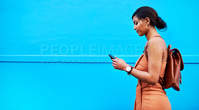 Buy stock photo Space, phone and mockup with woman by wall for communication, social media and internet. Technology, connection and vacation with female mobile user in city for online, networking and travel app