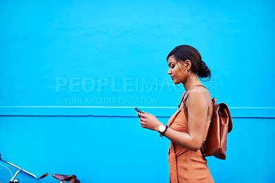 Buy stock photo Space, phone and travel with woman by wall for communication, social media and internet. Technology, connection and contact with female mobile user in city for mockup, networking and app