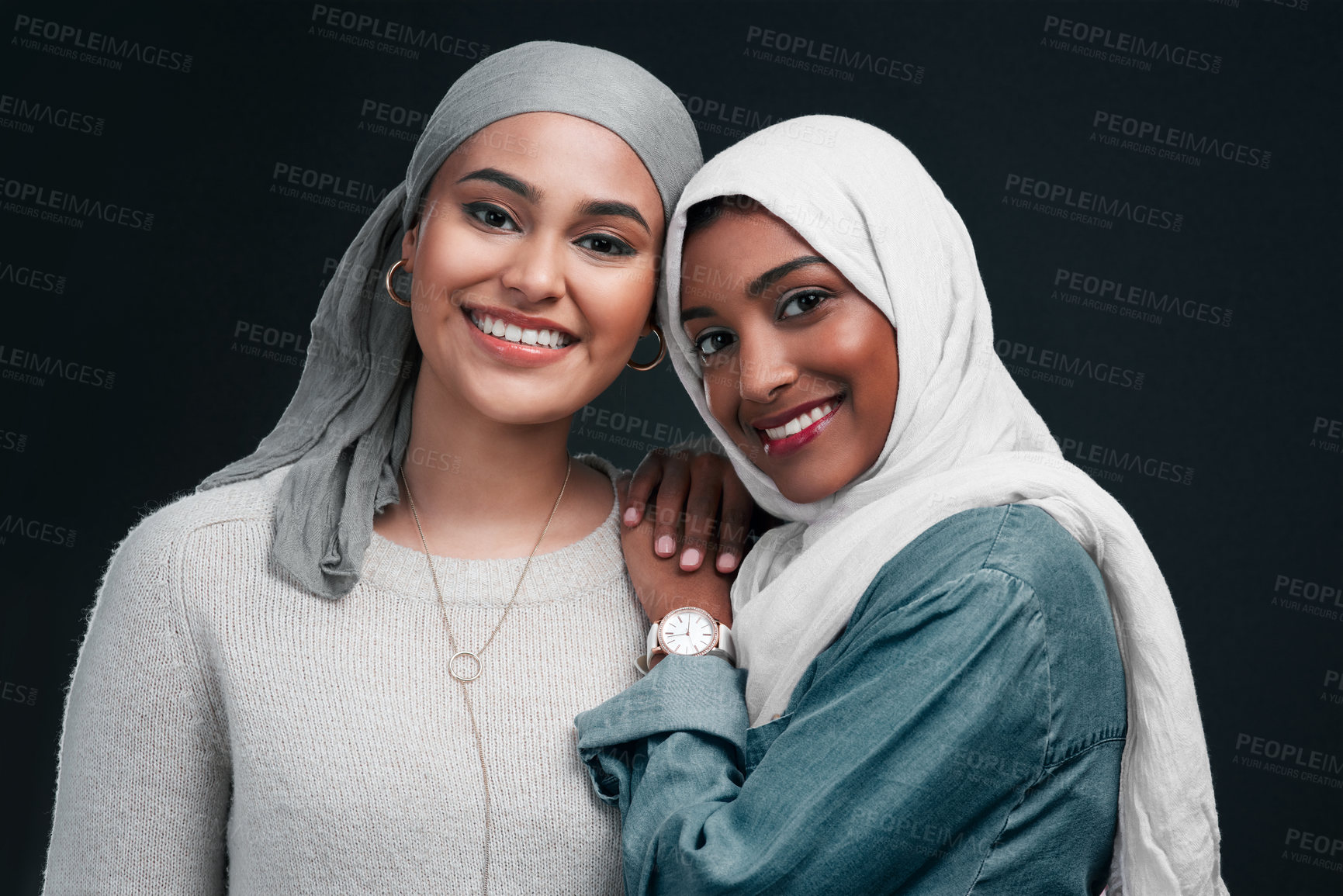 Buy stock photo Fashion, muslim women and smile in studio for culture, sisterhood and support on black background. Together, skincare and islamic people with cosmetics for wellness, hijab or attire for religion