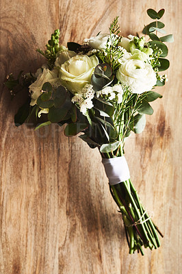Buy stock photo Still life shot of a beautiful bouquet on top of a wooden surface