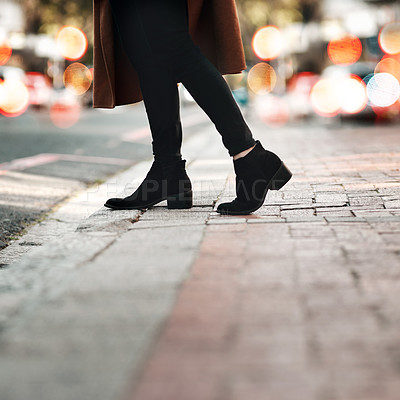 Buy stock photo Woman, legs and walking on road in the city for travel, tourism or sightseeing in the outdoors. Closeup leg of female person or traveler with high heel shoes cross street or taking walk in an urban town