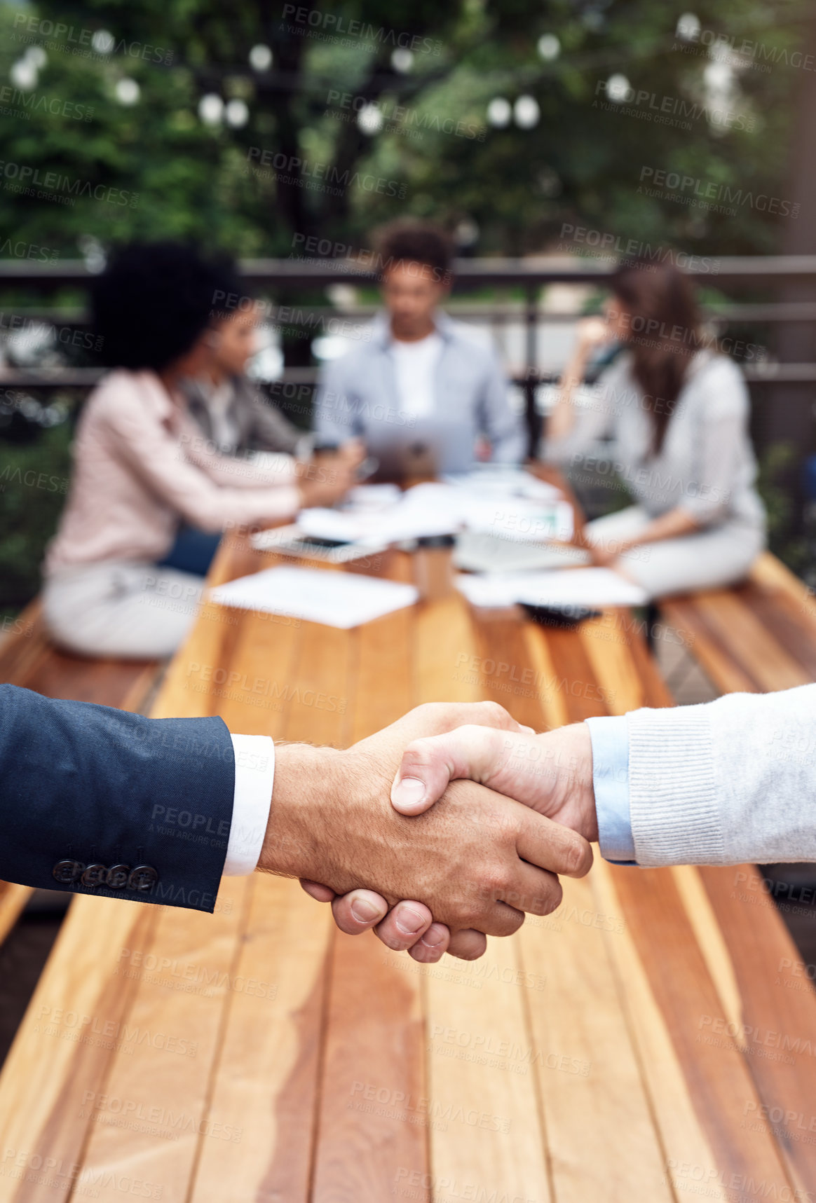 Buy stock photo Meeting, business people and teamwork with shaking hands for welcome, introduction and onboarding outdoor. Cafe, accountant employees and handshake for partnership, agreement and b2b deal by closeup