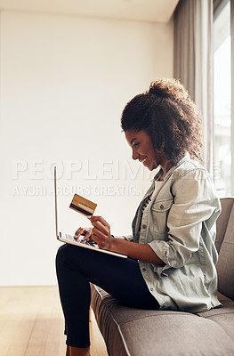 Buy stock photo Black woman, sofa and excited on laptop with credit card for online shopping, payment and saving plan. Living room, smile and couch at home for internet banking, budget and investment or finance