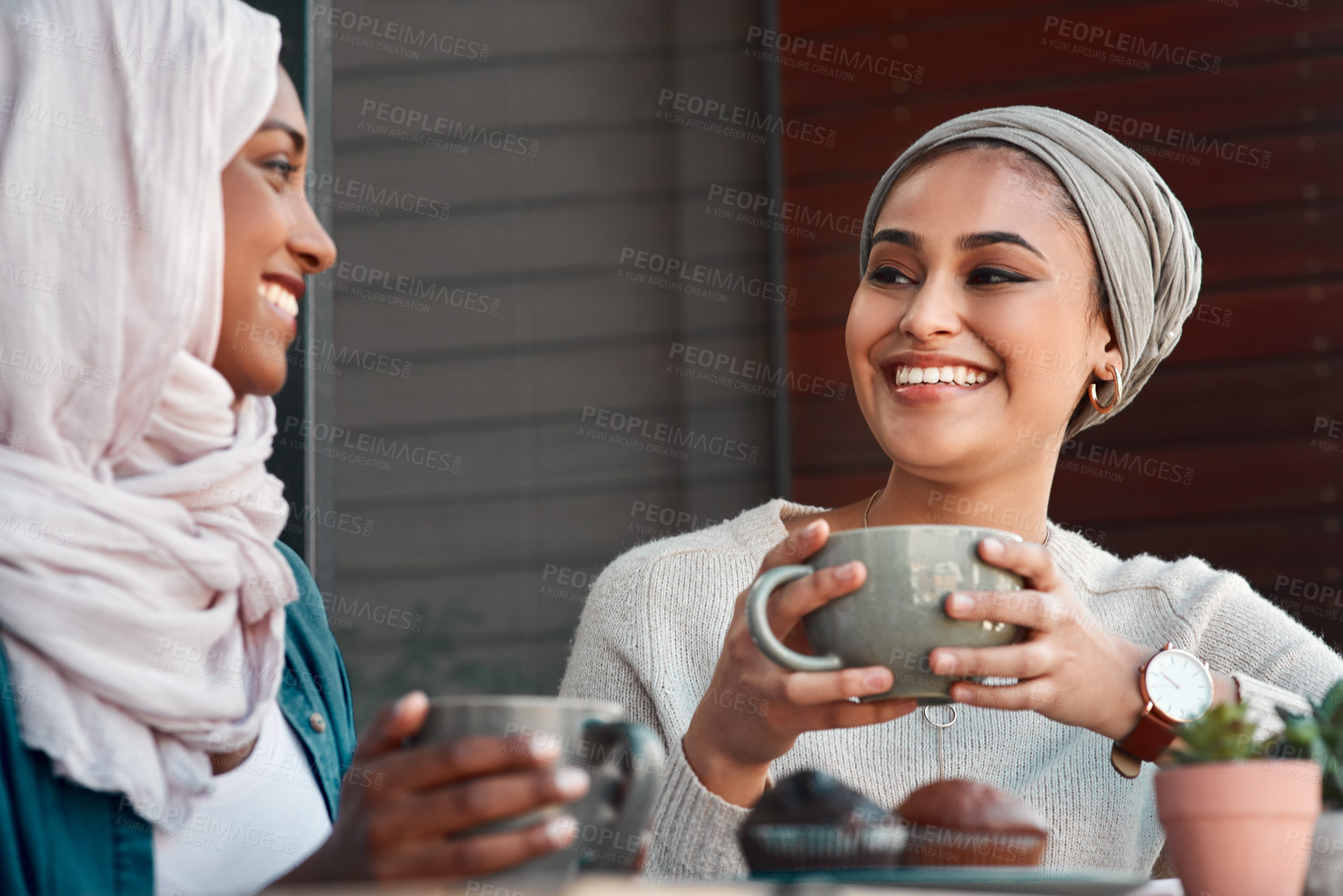 Buy stock photo Relax, coffee and muslim women in cafe for conversation, food and social. Happy, relax and culture with arabic female customer drinking tea in restaurant for discussion, happiness and meeting