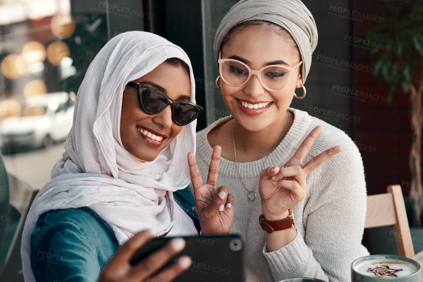 Buy stock photo Selfie, muslim women and friends with peace sign in city for social media, influencer content creation or fashion blog. Happy gen z people in Saudi Arabia, emoji profile picture or online photography