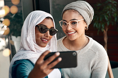 Buy stock photo Selfie, muslim women and friends smile in city for social media, influencer content creation or fashion blog. Young gen z people in Saudi Arabia for profile picture, online photography and sunglasses