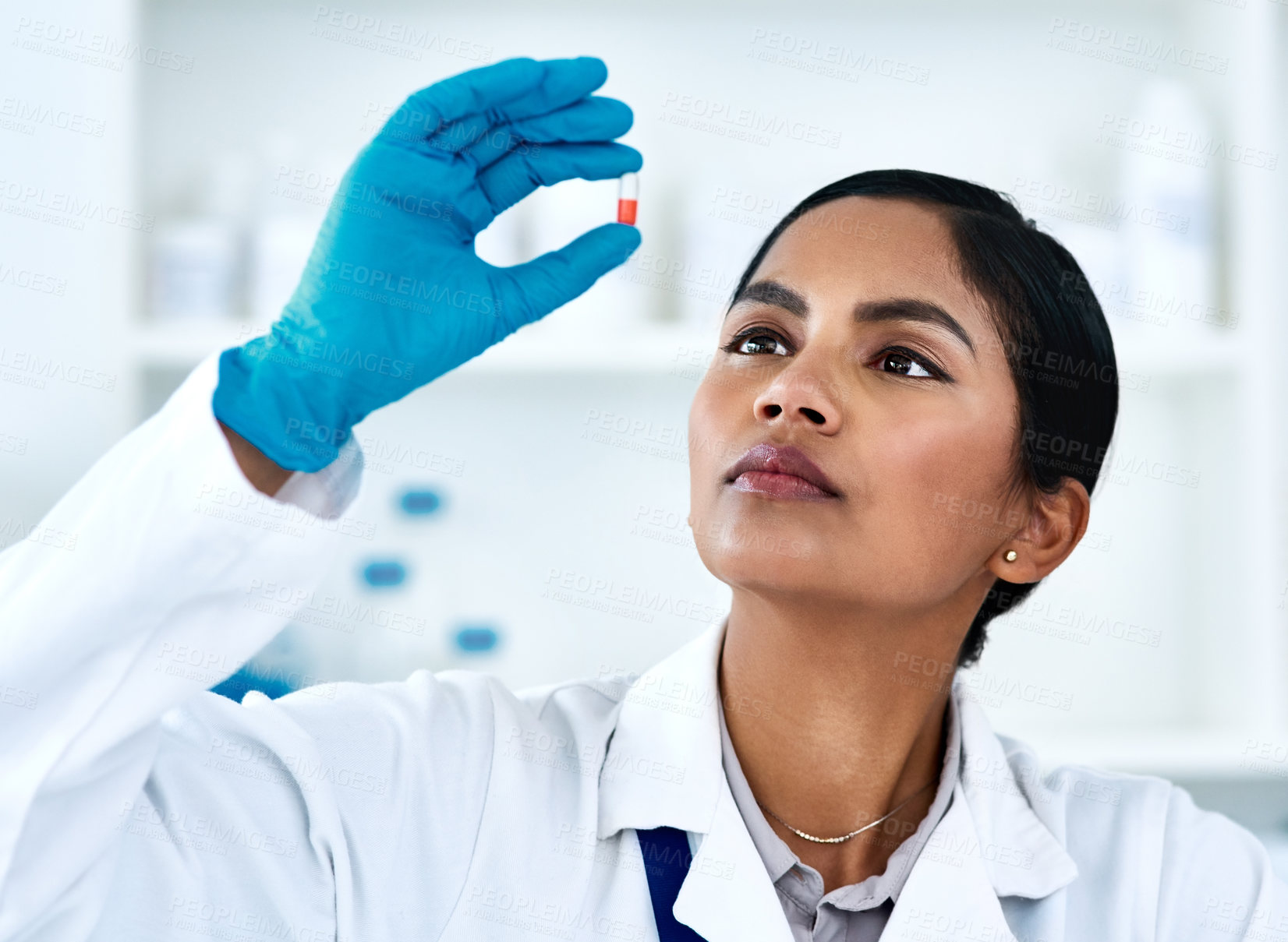 Buy stock photo Woman, pills and medical science research or scientist development for future drugs, medicine or product. Face of female worker in laboratory for pharmaceutical discovery, innovation and analysis