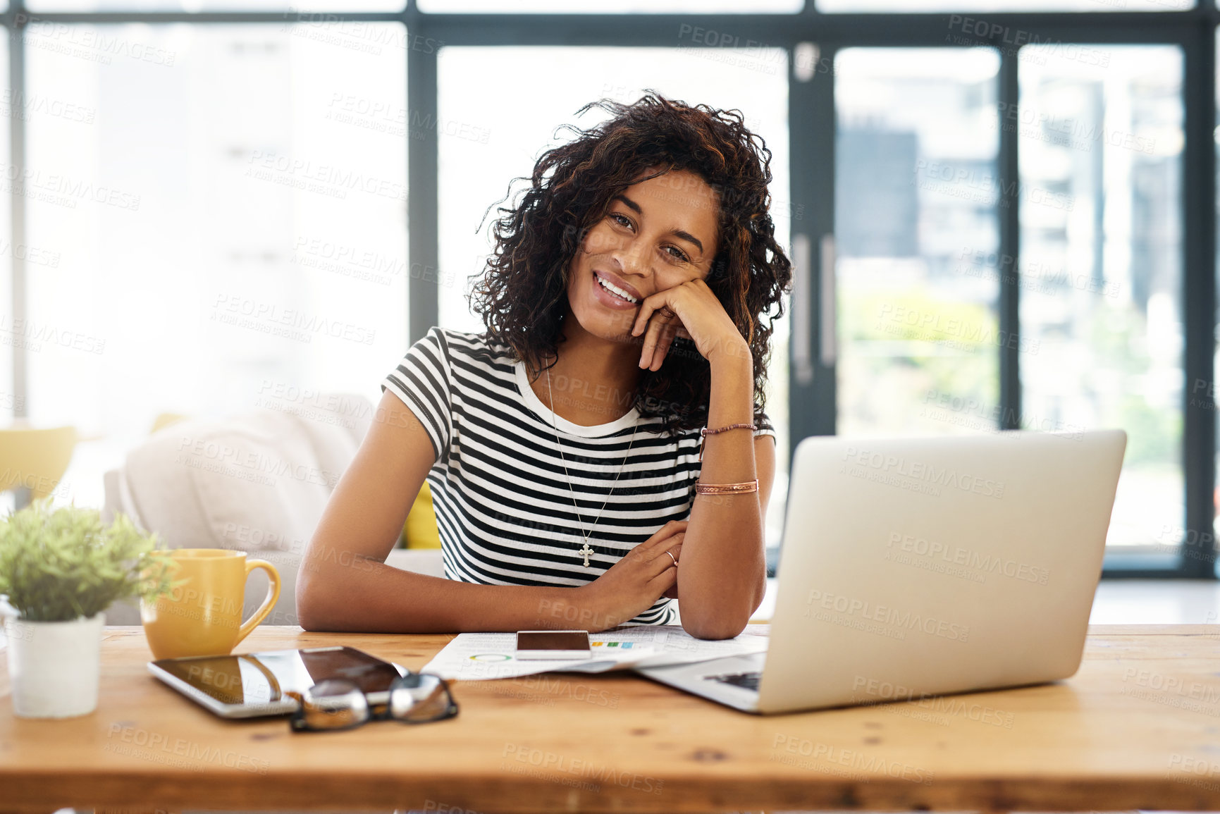 Buy stock photo Portrait, smile and woman with laptop, office and ux designer with documents, online and creative. Lens flare, user research and person in design agency, tech and working for project and Kenya