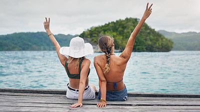 Buy stock photo Girl friends, peace hand sign and beach holiday with happiness and freedom on Thailand vacation. Women travel back and tropical island with a wood deck by the sea and ocean in summer outdoor by water