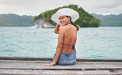 Buy stock photo Travel, island and portrait of woman by ocean for holiday, summer vacation and weekend getaway in Maldives. Happy, tropical beach and female person on boardwalk for tourism, luxury trip and adventure